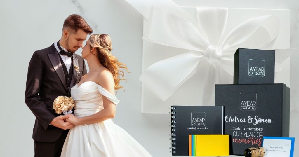 Newlyweds with A Year of Dates wedding gift boxes, personalised memory box and date cards — wedding gift ideas for couples UK